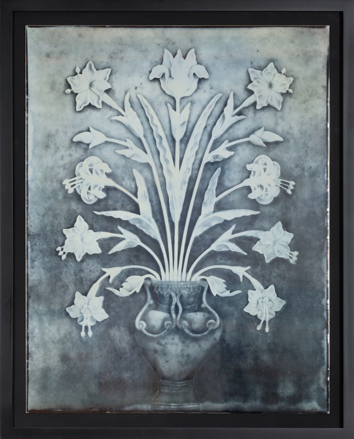 Color image of a daguerreotype depicting a vase with multiple flowers framed in black