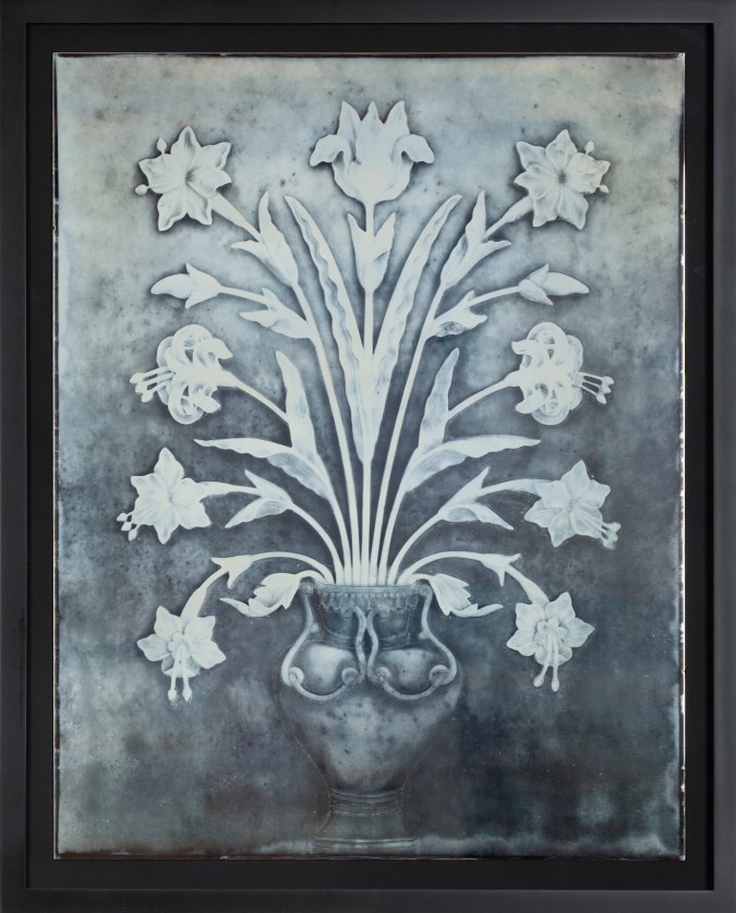 Color image of a daguerreotype depicting a vase with multiple flowers framed in black