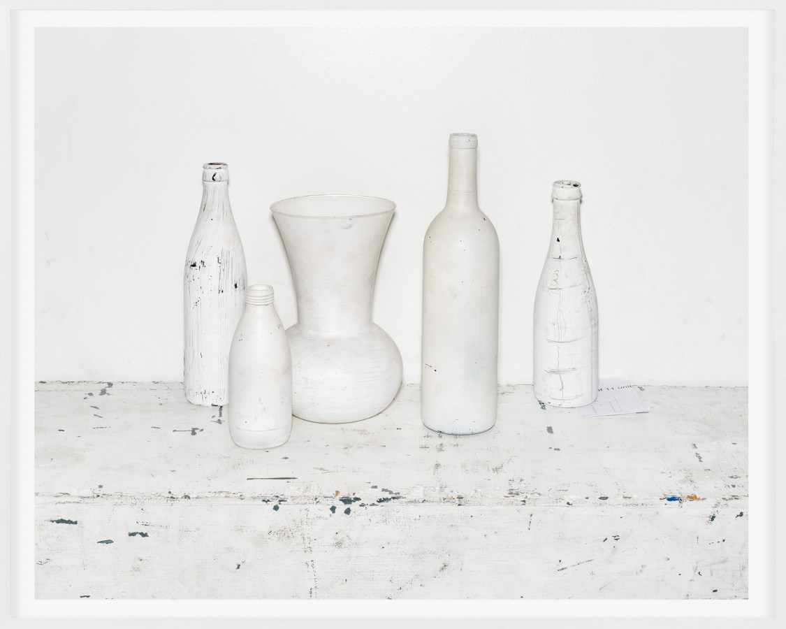 A color photograph of a staged still life using vessels