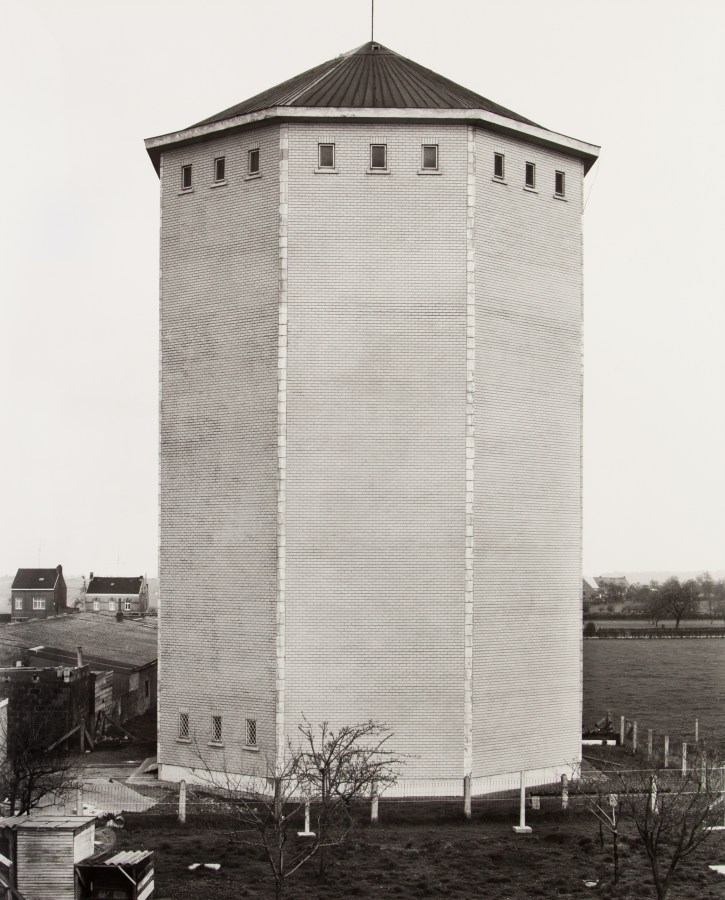Black and white photograph of a water tower exterior
