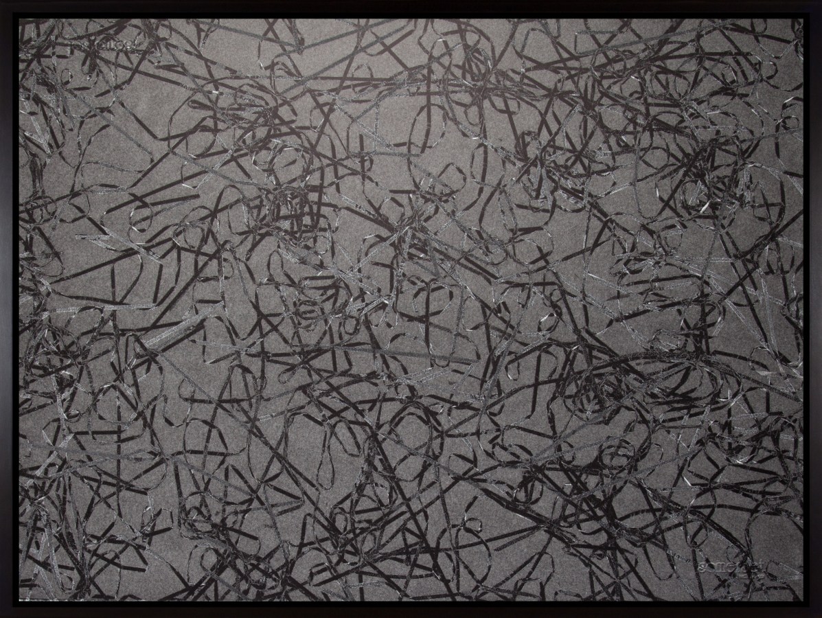 Black and white photograph of outlines of tangled cassette tape