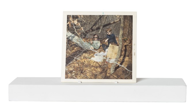 Painting of two people wearing sunglasses having a picnic in a forest