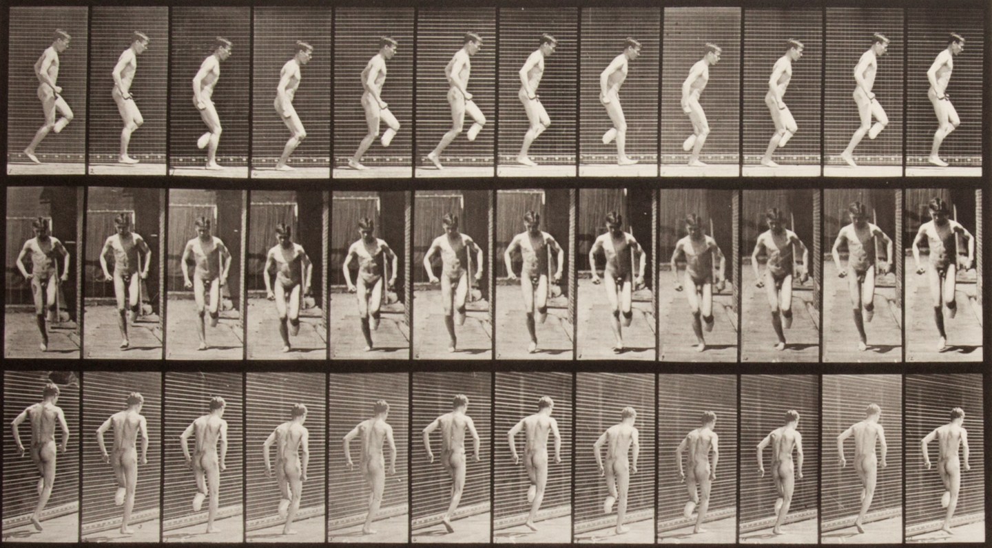 Three rows of small black and white photographs of a nude man hopping on his foot.
