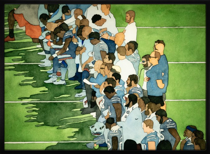 Color image of a light box depicting a rendering of a football team during the national anthem