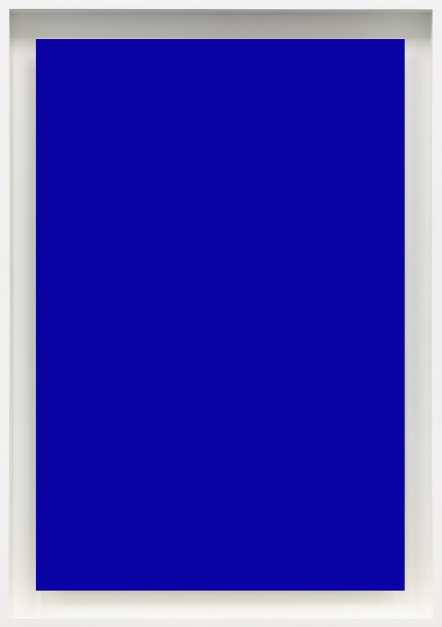 Color image of a blue photogram framed in white