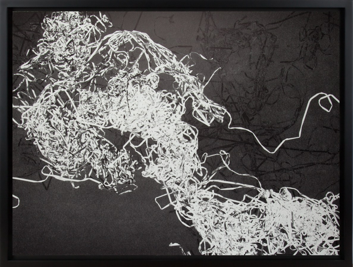 A framed abstract monoprint, of a pile of tape pulled from a casette