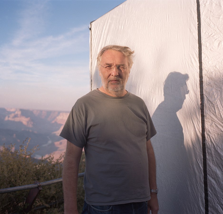 Color image of artist Richard Learoyd outside of his camera obscura in the grand canyon