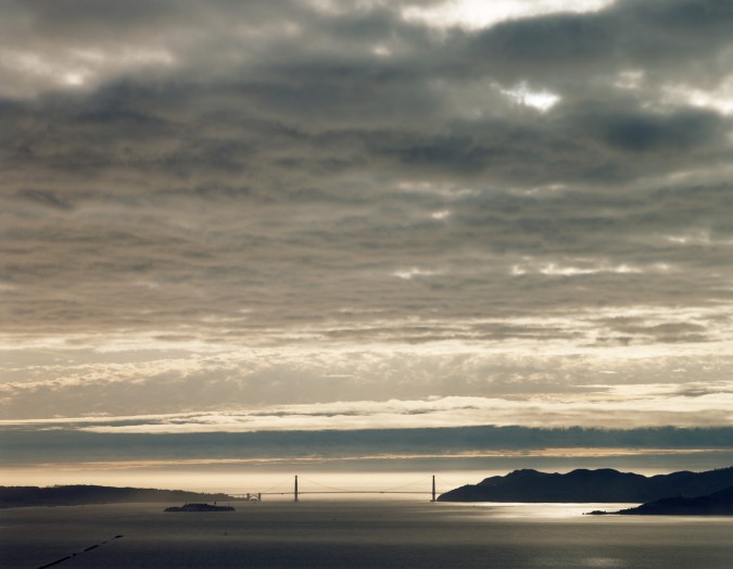 Color photograph of clouds over the Golden Gate Bridge