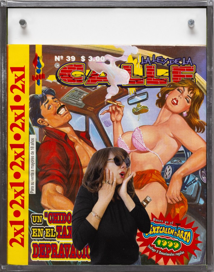 Color image of a comic book encased in a glass and metal frame with a collaged image over the cover