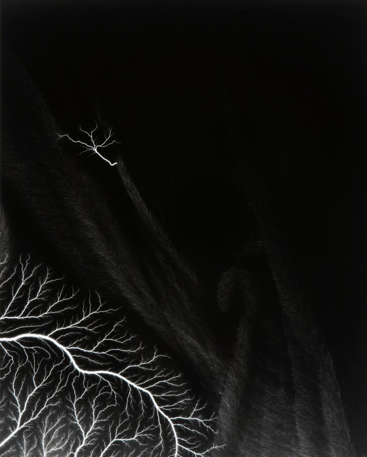 Black and white photograph of lighting striking