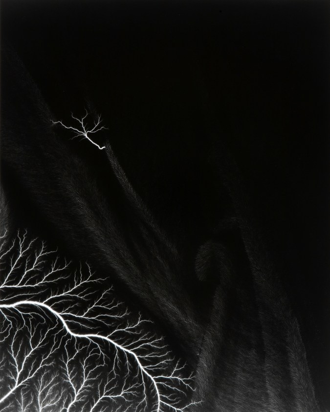 Black and white photograph of lighting striking