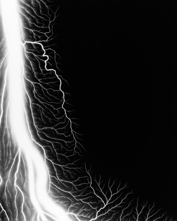 Black and white photograph of lighting striking