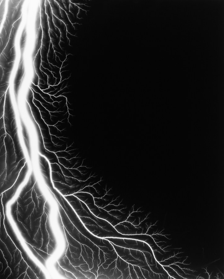 Black and white photograph of lighting striking