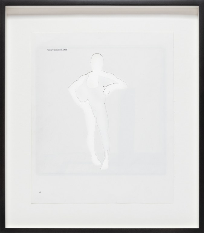 Color image of a collage using white paper to depict a figure in a pose framed in black