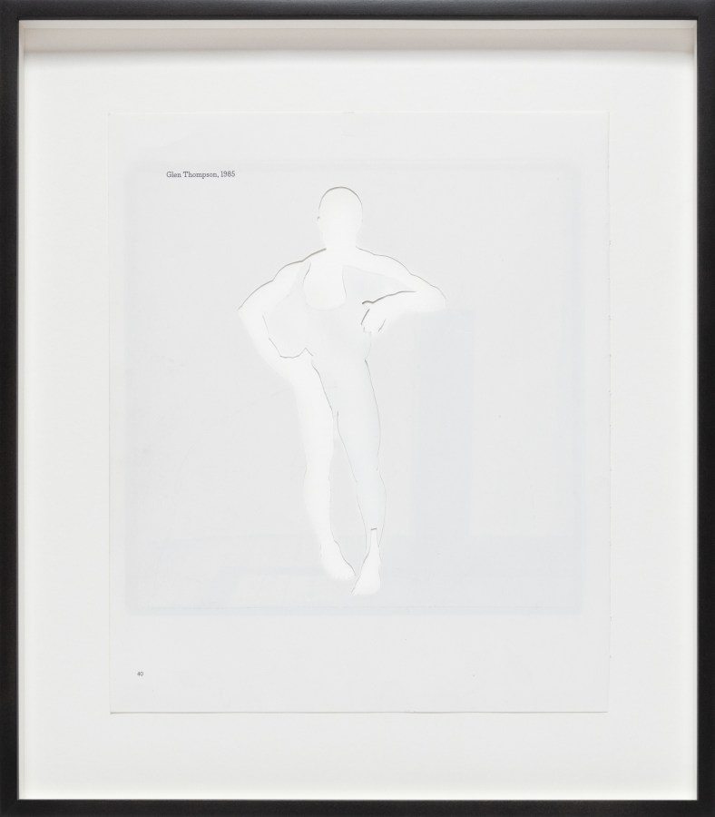 Color image of a collage using white paper to depict a figure in a pose framed in black