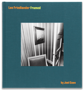 Color image of a book cover with a black and white photograph of a doorway with a painting and chair
